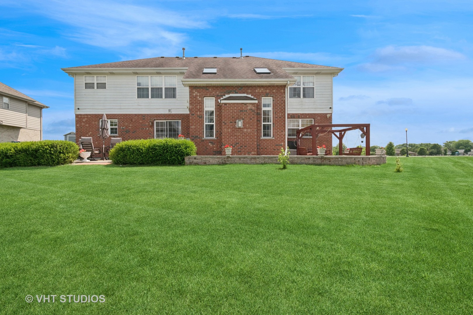 259 Fir Street Beecher, IL 60401 - Photo 34 of 38 a view of a house with a yard and sitting area