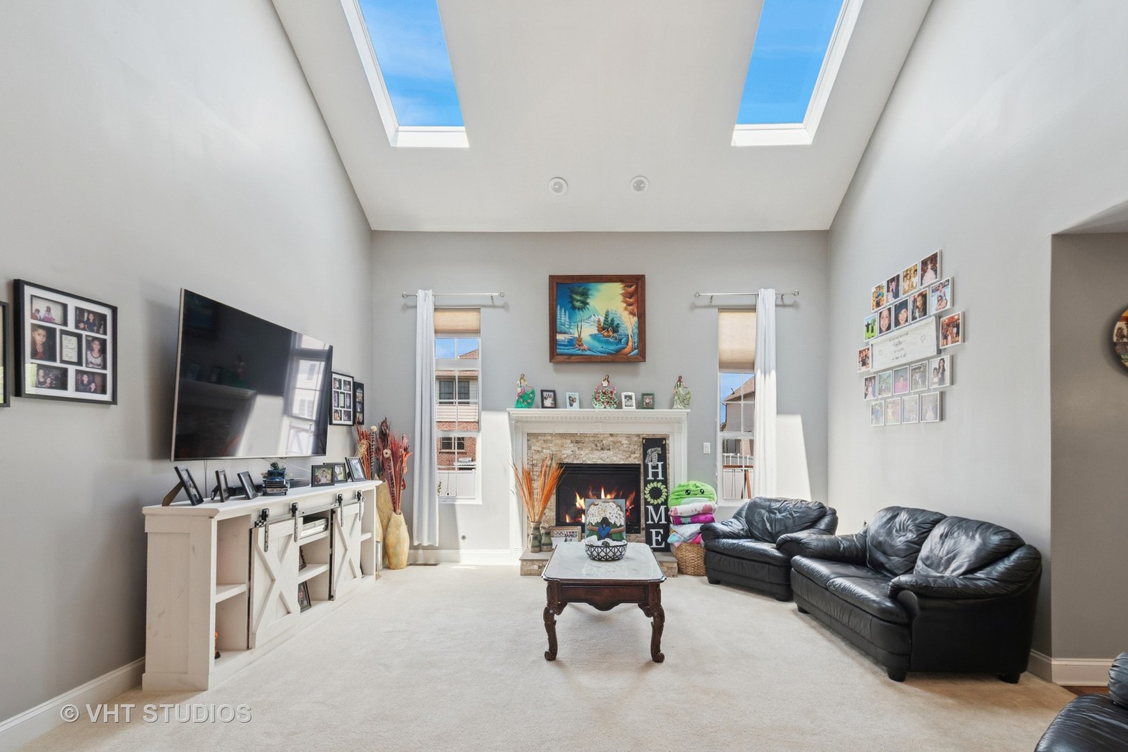 259 Fir Street Beecher, IL 60401 - Photo 6 of 38 a living room with furniture a flat screen tv and a fireplace