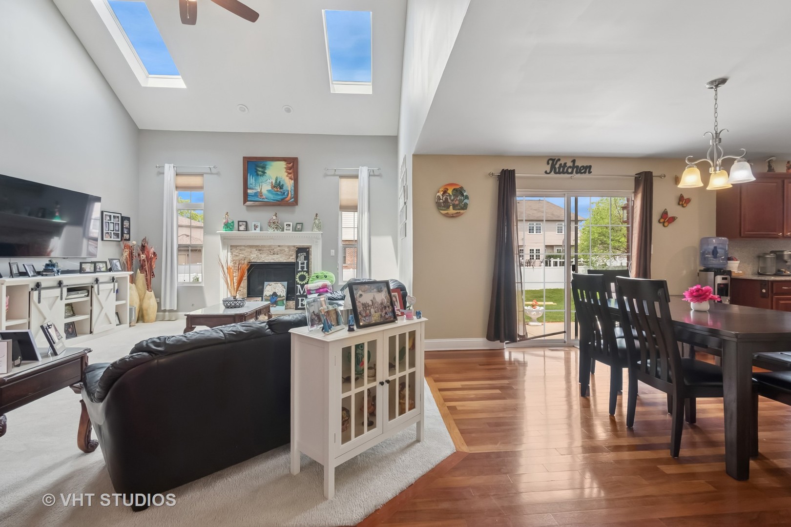 259 Fir Street Beecher, IL 60401 - Photo 9 of 38 a living room with furniture a fireplace and a flat screen tv