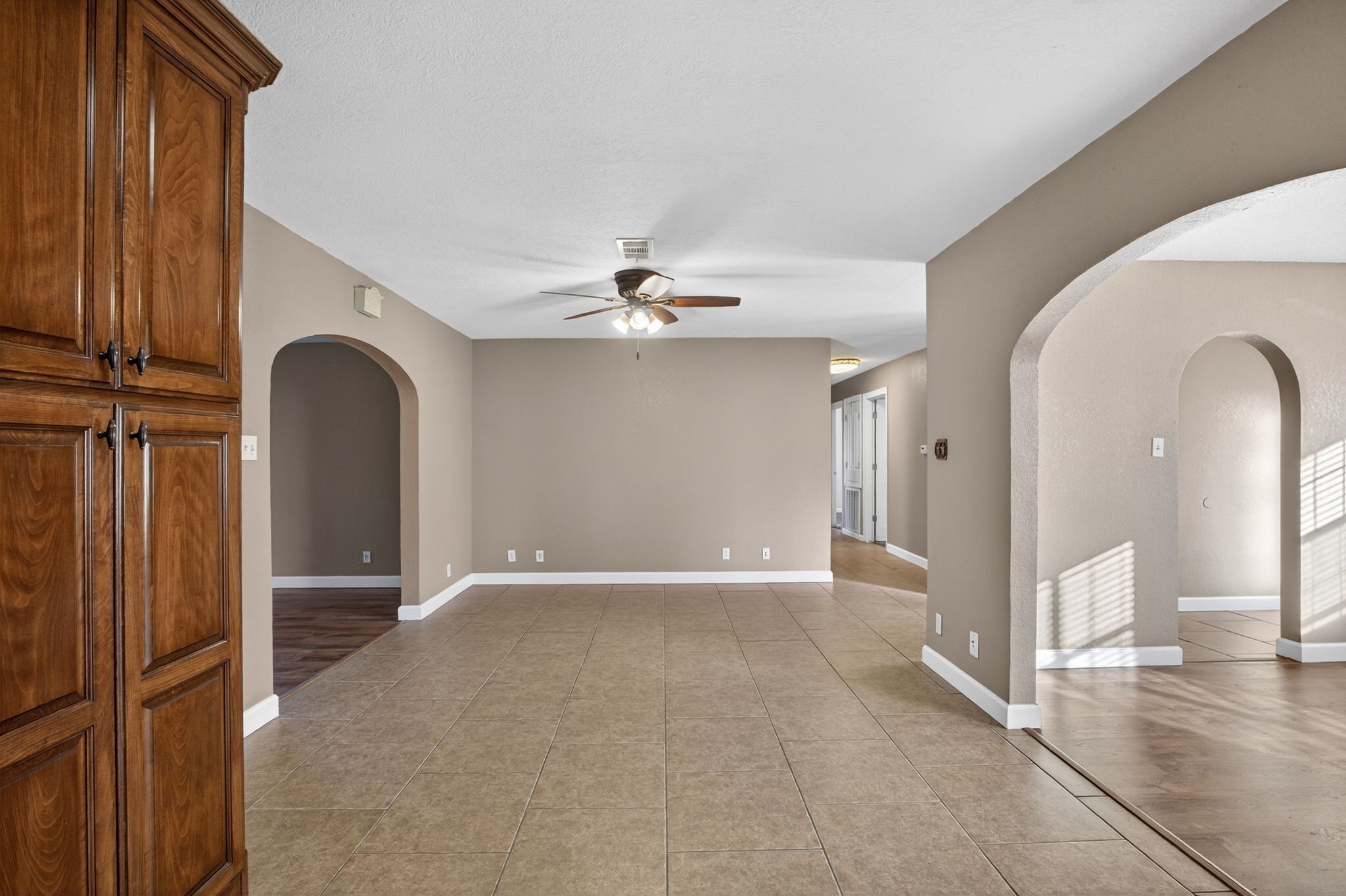 255 Gilmer Street Bridge City, TX 77611 - Photo 14 of 37 a view of a livingroom with a ceiling fan window and entryway