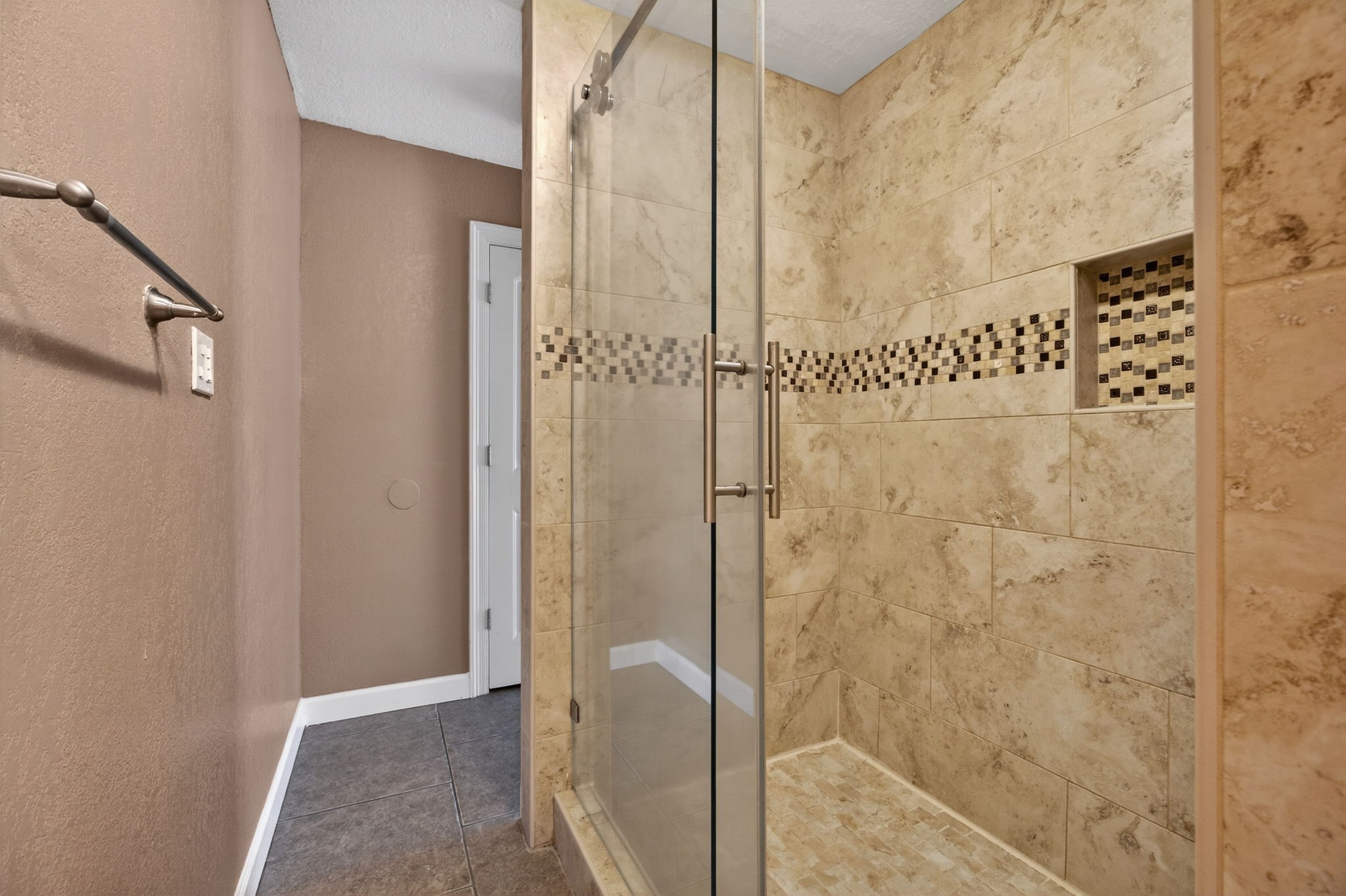 255 Gilmer Street Bridge City, TX 77611 - Photo 23 of 37 a bathroom with a shower