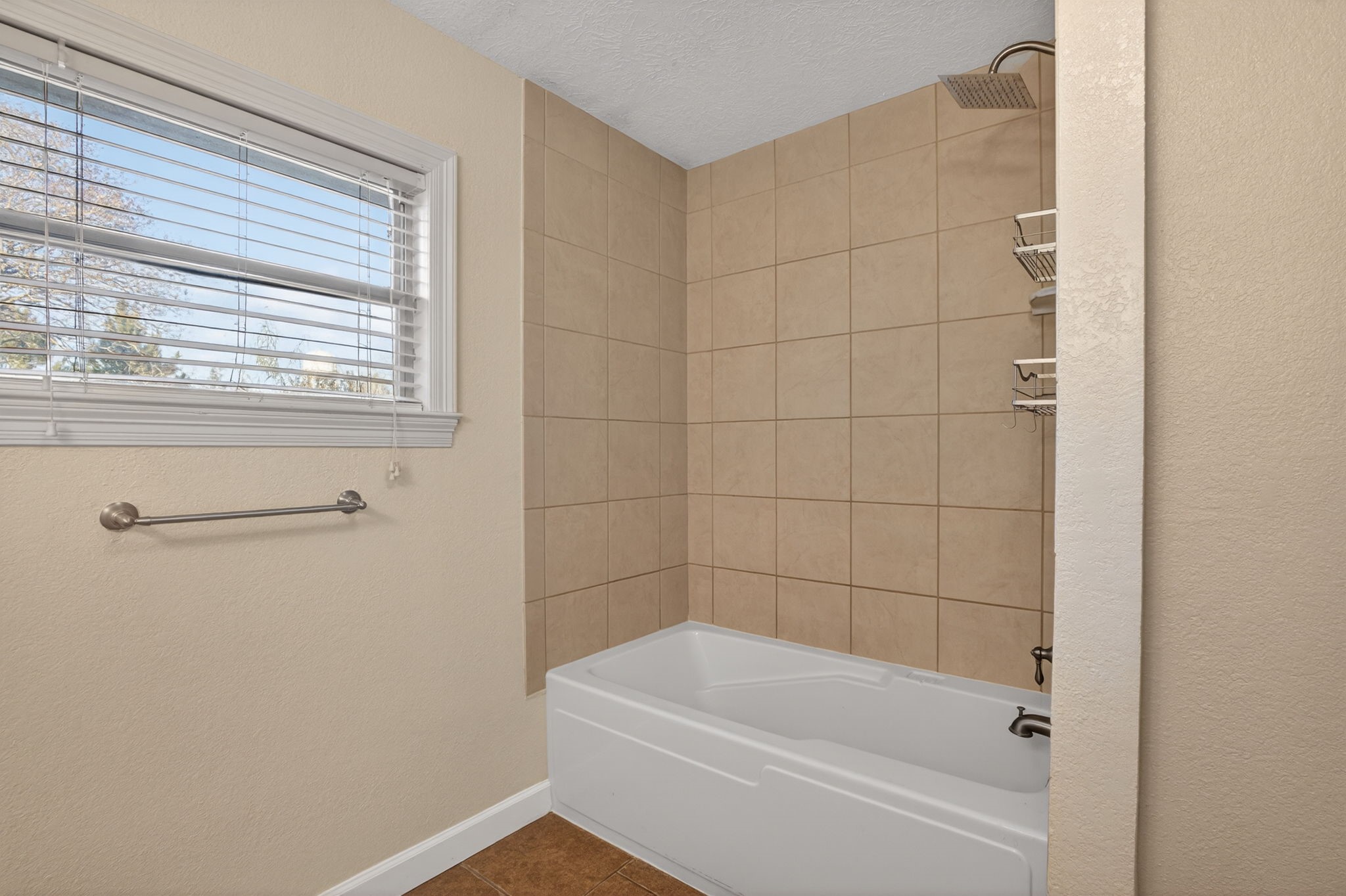 255 Gilmer Street Bridge City, TX 77611 - Photo 27 of 37 a bathroom with a bathtub