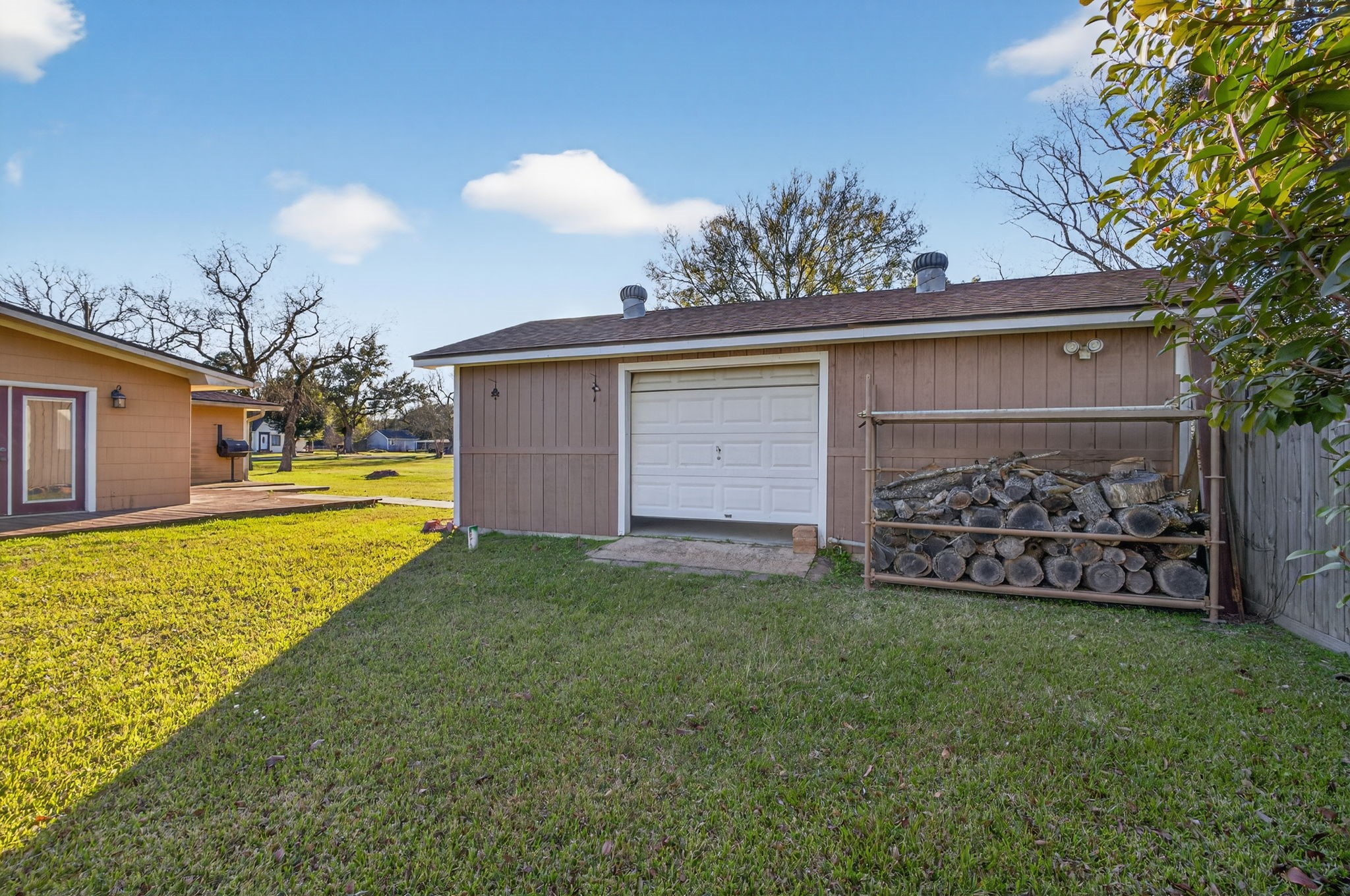 255 Gilmer Street Bridge City, TX 77611 - Photo 33 of 37 a view of a backyard of the house