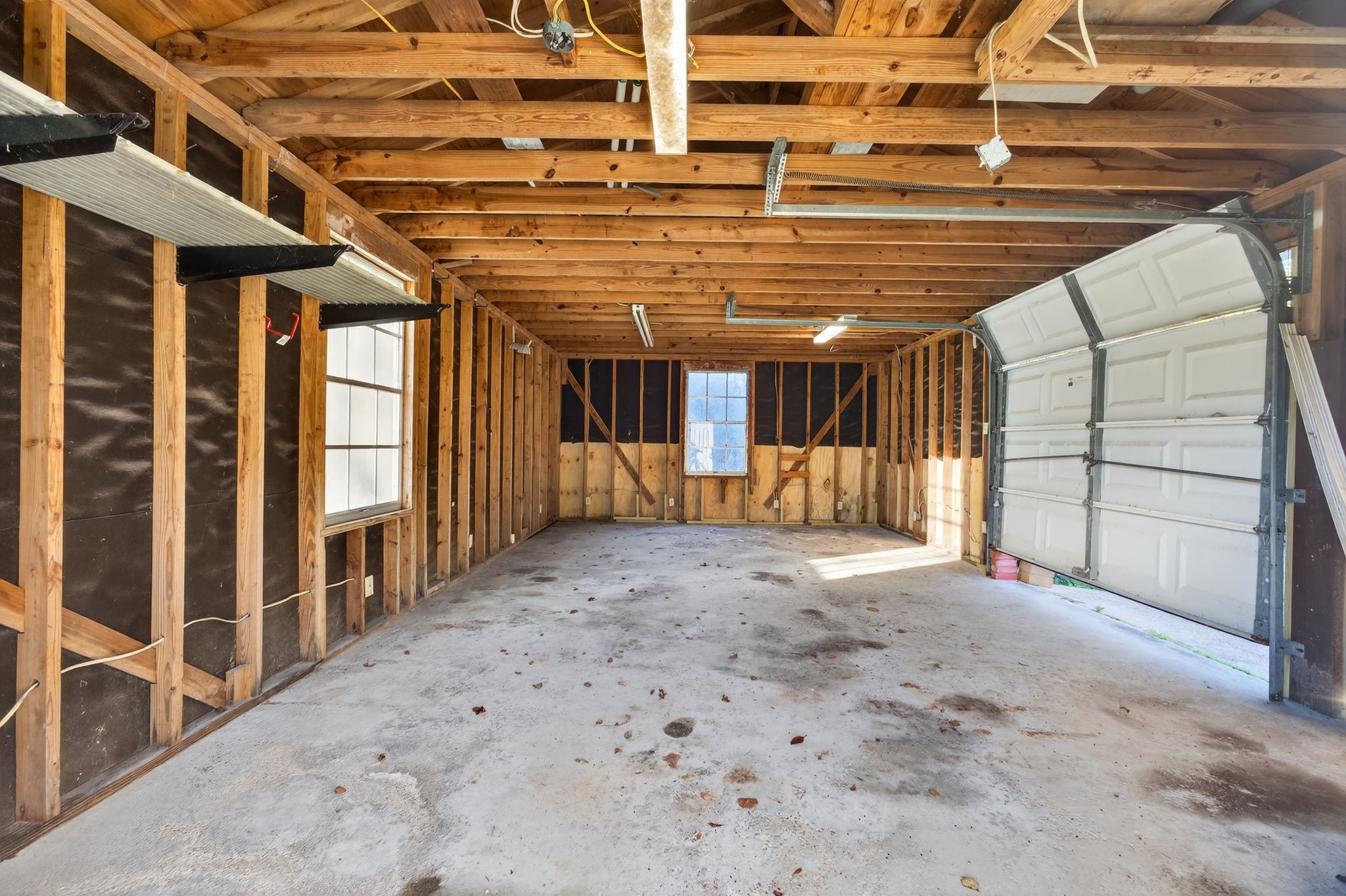 255 Gilmer Street Bridge City, TX 77611 - Photo 34 of 37 a view of a room with wooden walls