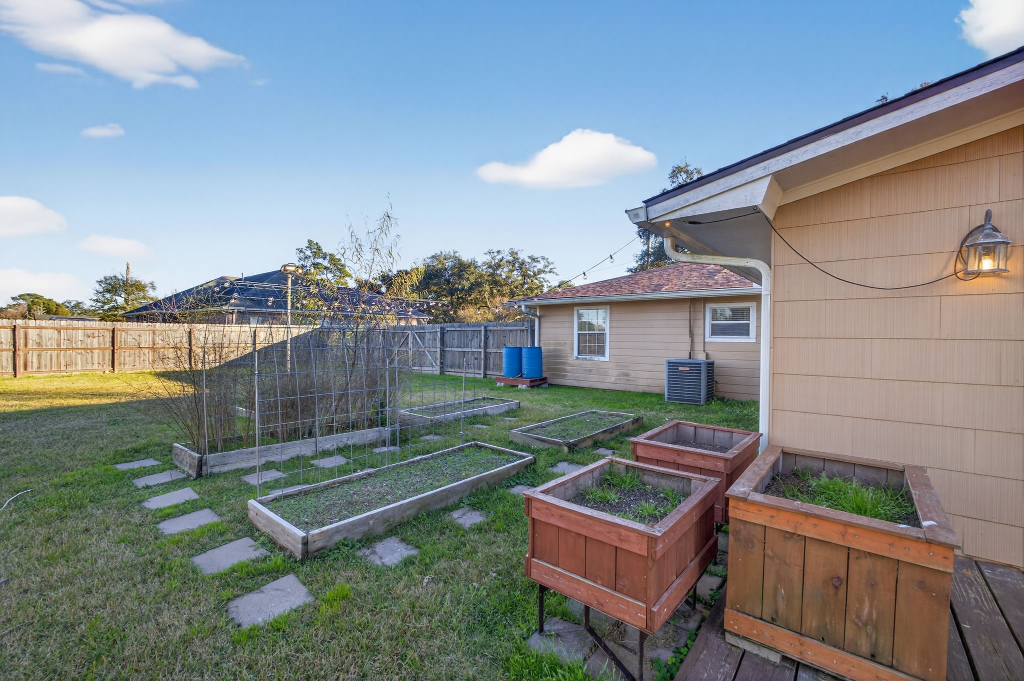 255 Gilmer Street Bridge City, TX 77611 - Photo 35 of 37 a view of a backyard with a patio