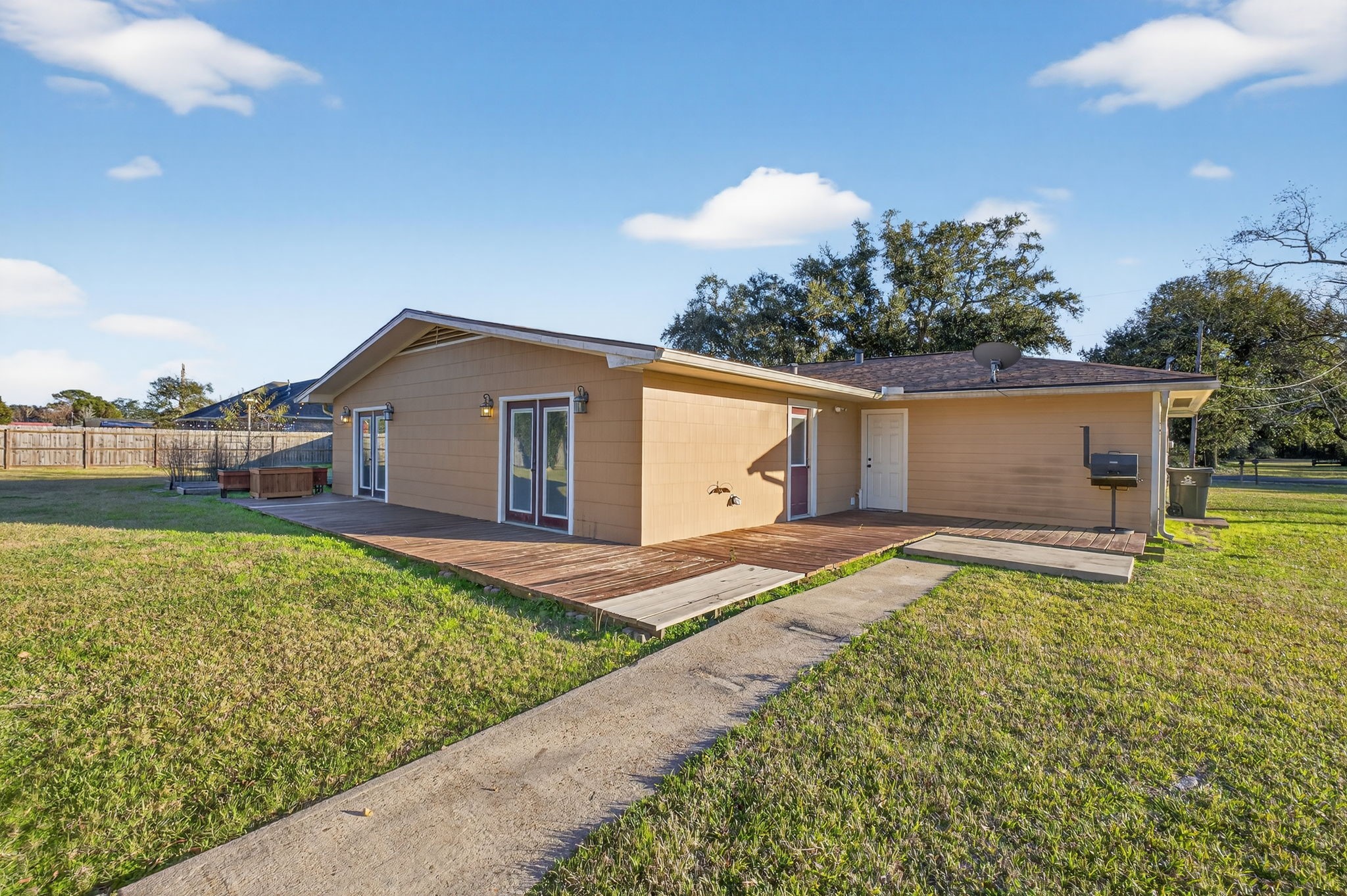 255 Gilmer Street Bridge City, TX 77611 - Photo 37 of 37 a front view of house with yard and outdoor seating