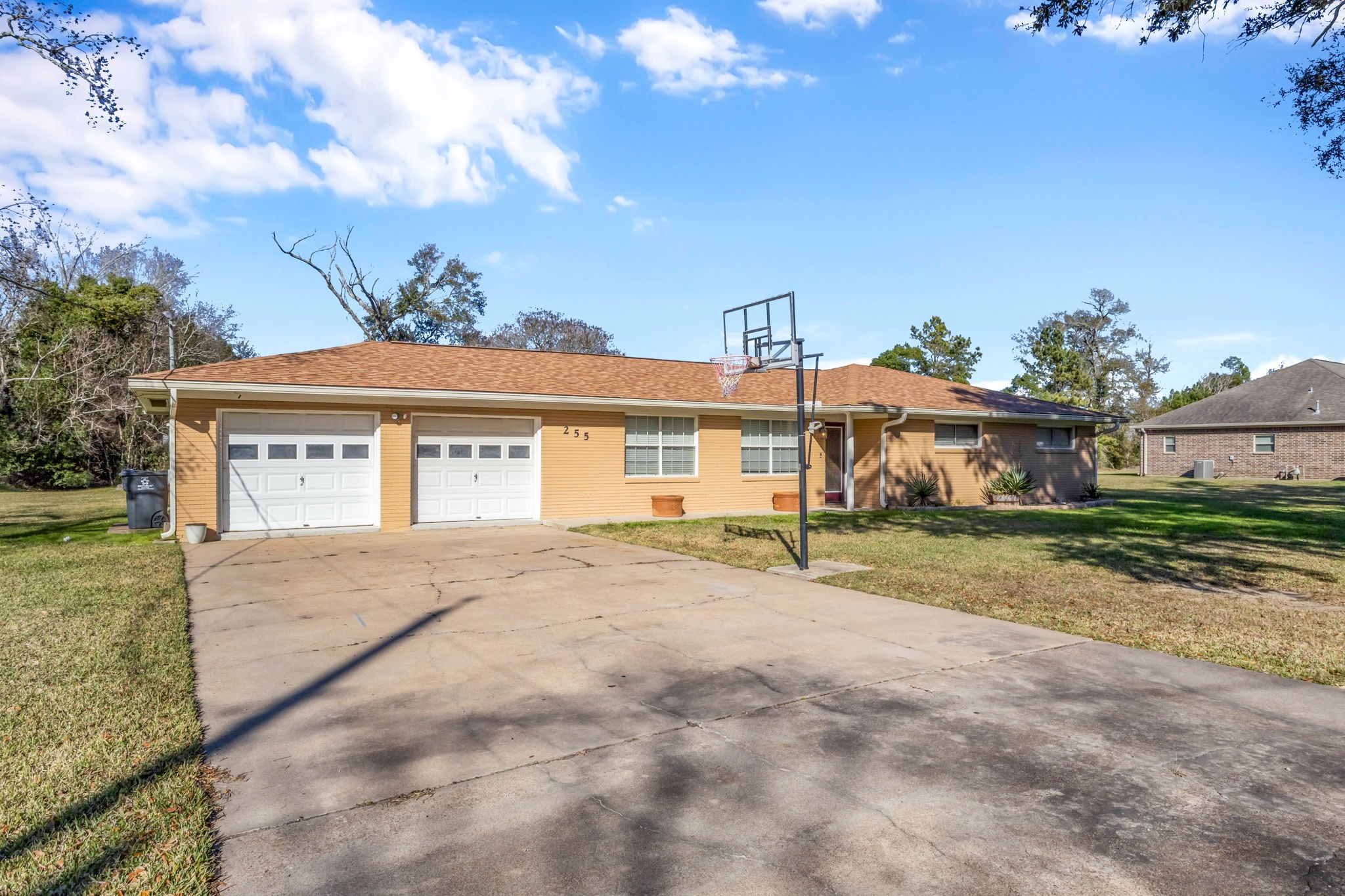 255 Gilmer Street Bridge City, TX 77611 - Photo 4 of 37 front view of a house with a big yard