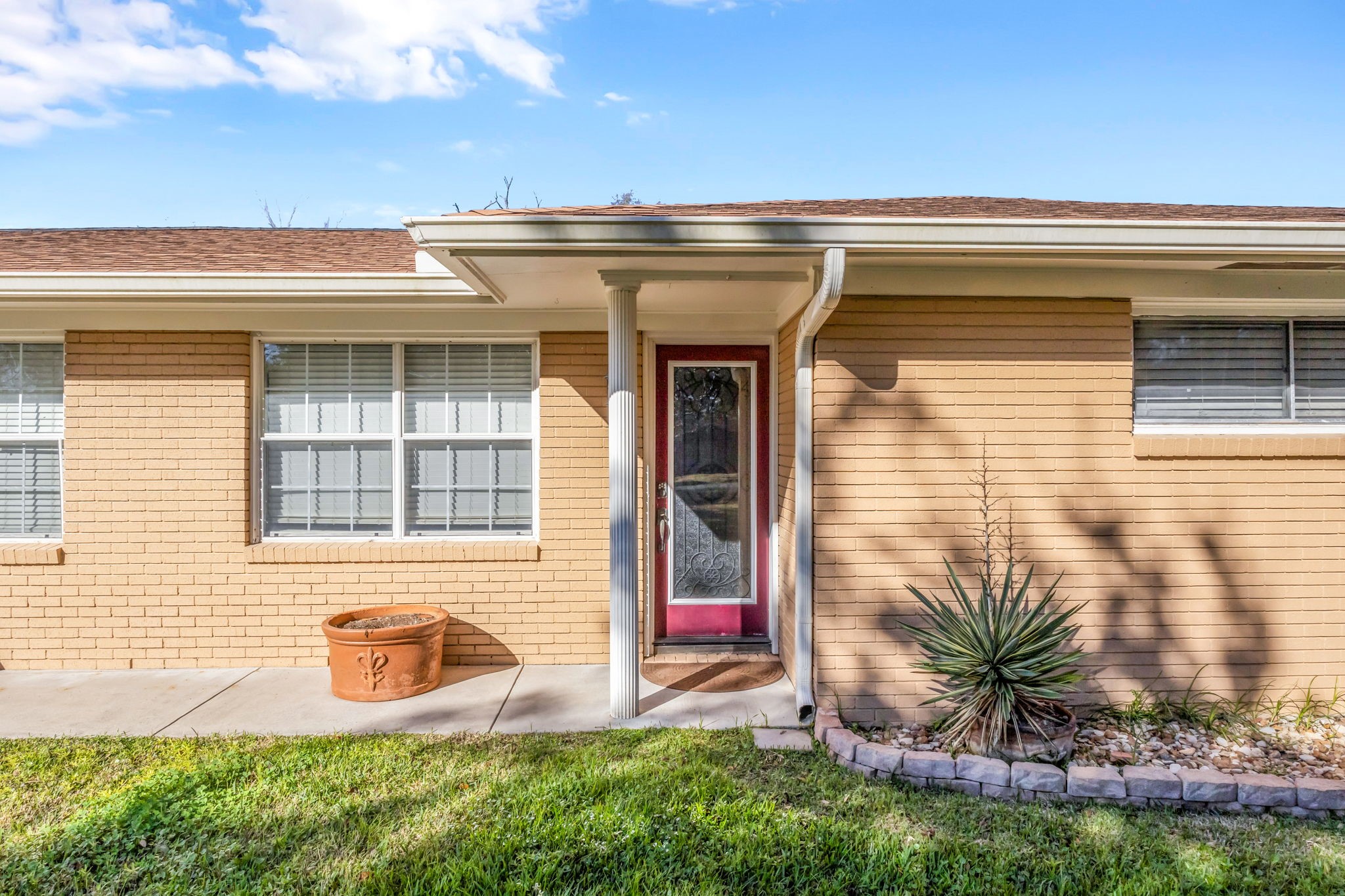 255 Gilmer Street Bridge City, TX 77611 - Photo 6 of 37 a front view of a house with a yard