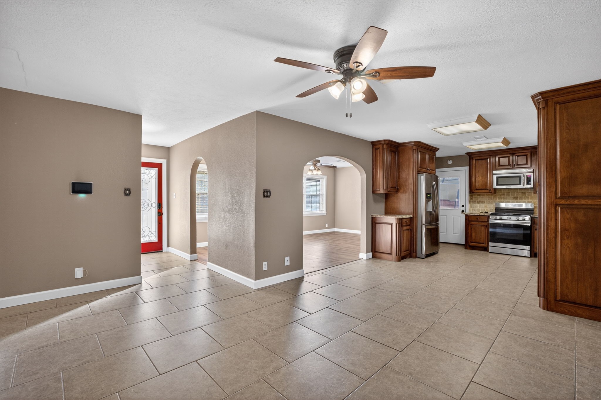 255 Gilmer Street Bridge City, TX 77611 - Photo 8 of 37 a view of a livingroom with a projector & furniture