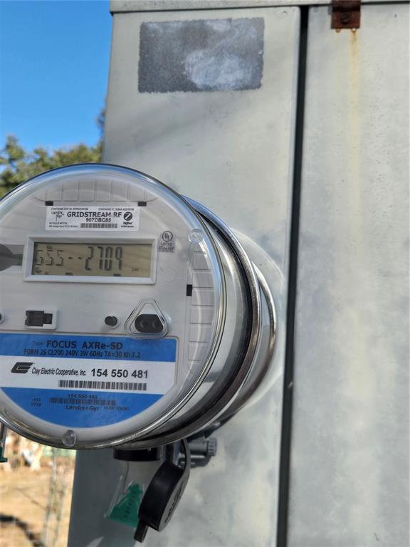 2121 Southeast 170th Avenue Road Silver Springs, FL 34488 - Photo 23 of 23 a view of a room with a sink and a mirror