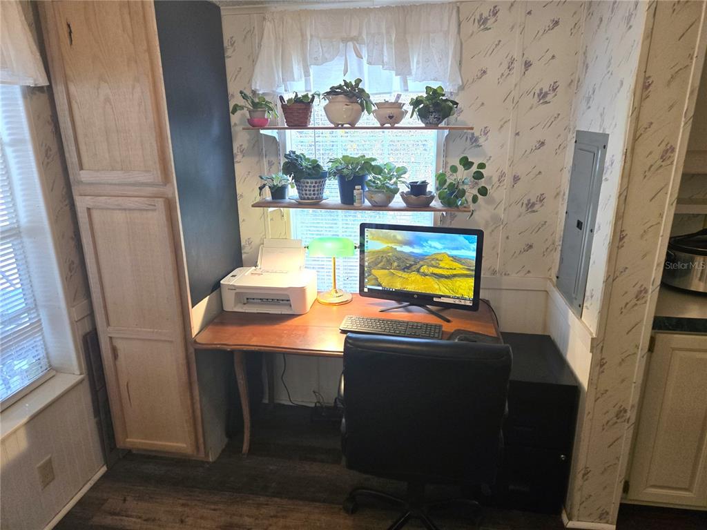 2121 Southeast 170th Avenue Road Silver Springs, FL 34488 - Photo 10 of 23 a view of a bathroom with a sink and a mirror