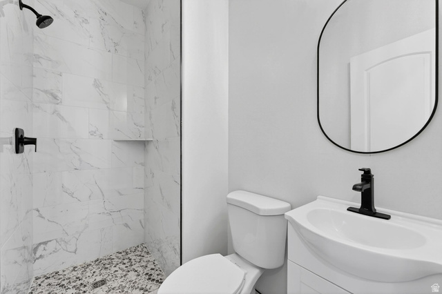 572 West 500th Street North Mapleton, UT 84664 - Photo 17 of 46 Full bathroom featuring vanity and a marble finish shower