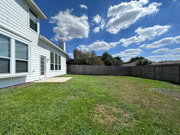 a view of a backyard with a garden