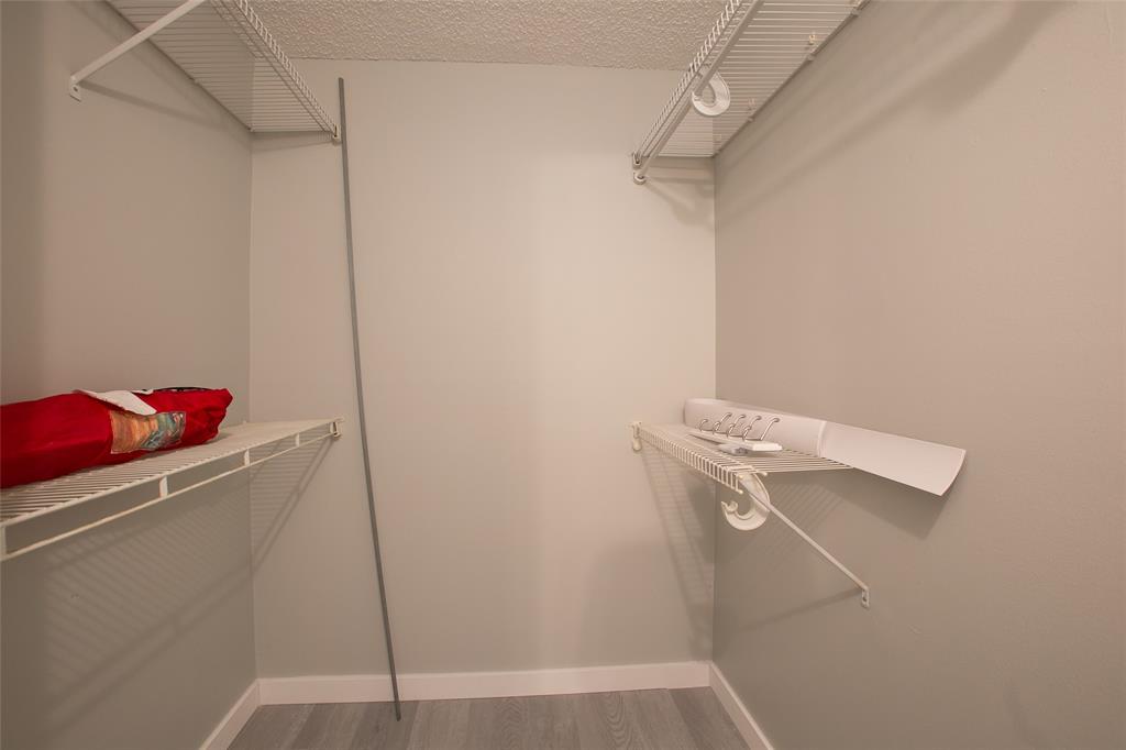 10557 Northwest 10th Street, Unit 101 Pembroke Pines, FL 33026 - Photo 10 of 19 a room with a shower and a fan