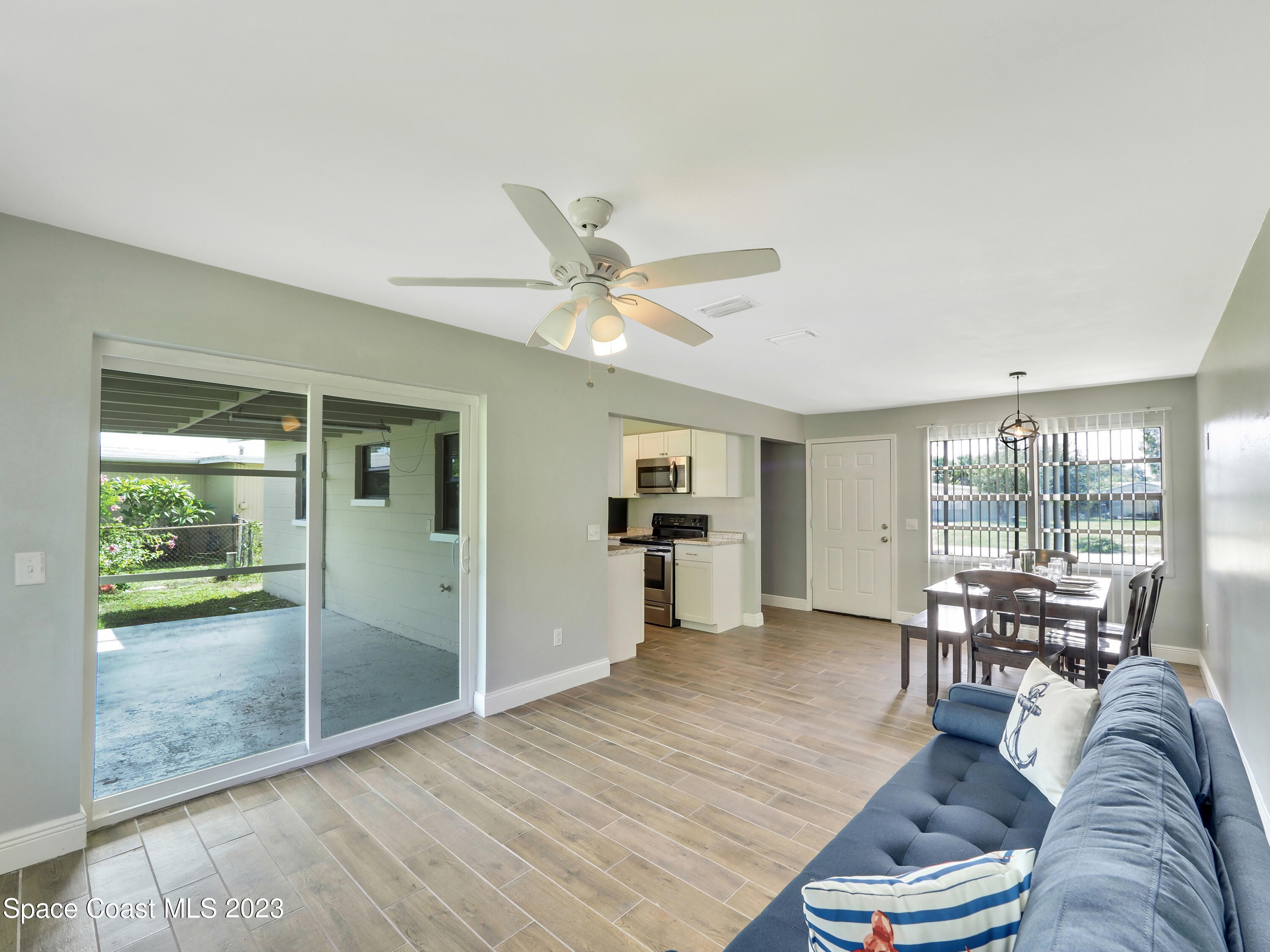 2056 Little John Road Melbourne, FL 32935 - Photo 8 of 11 2056 Living_Dining 2