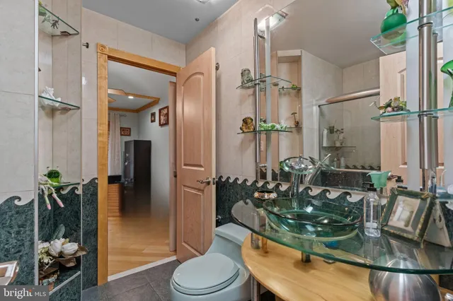 a view of a house with backyard sitting area and garden