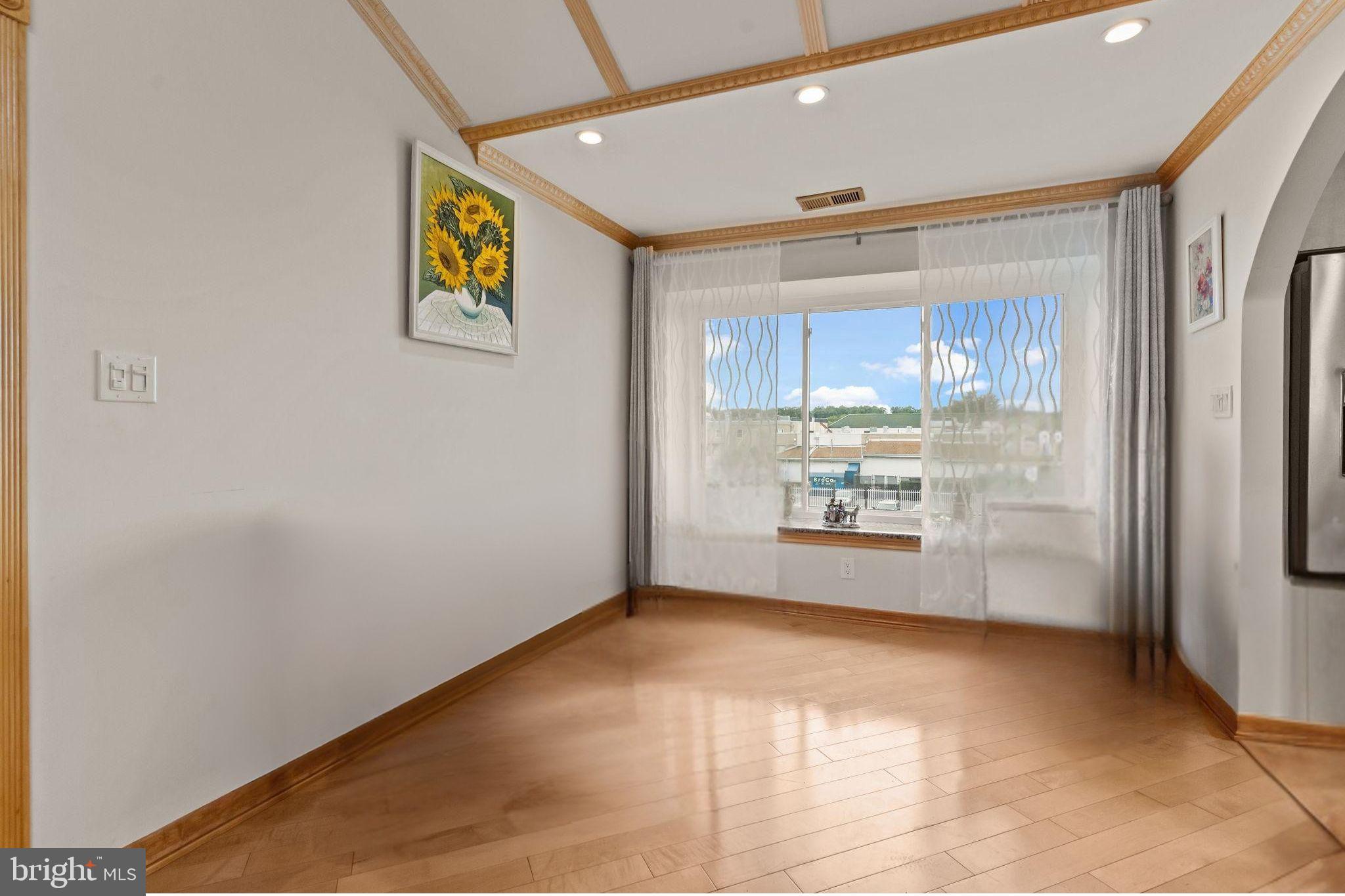 75 Bonnie Gellman Court, Unit D75 Philadelphia, PA 19114 - Photo 10 of 37 a view of an empty room and window