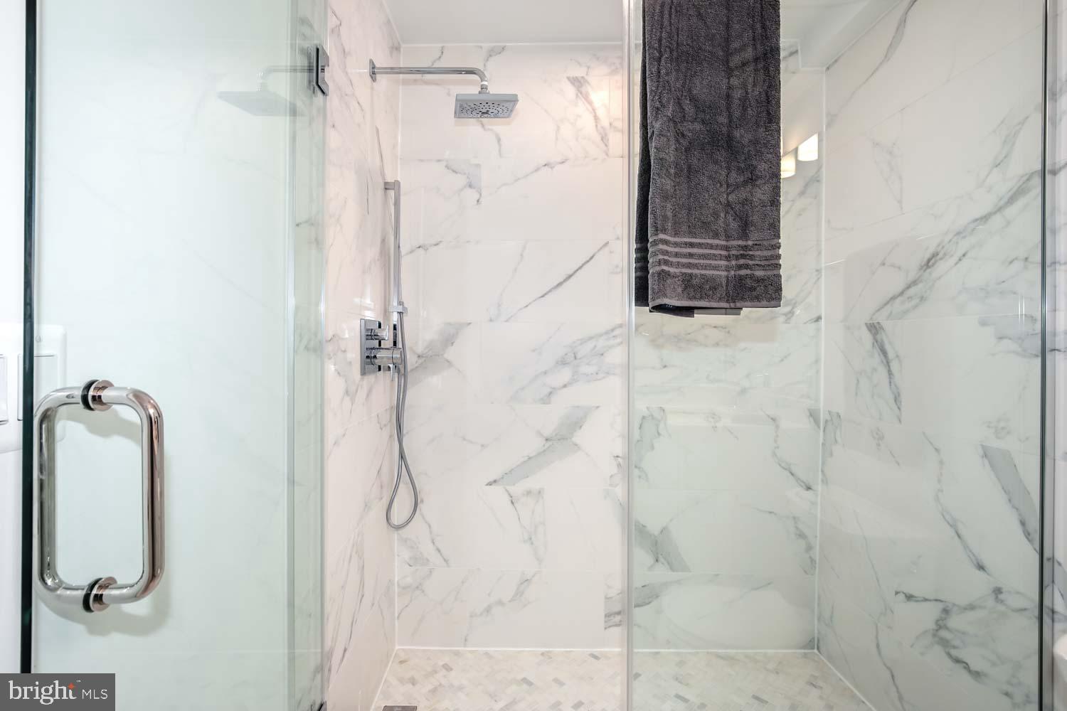 2601 30th Street Northeast, Unit 11 Washington, DC 20018 - Photo 23 of 32 a bathroom with a shower