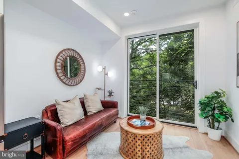 a kitchen with stainless steel appliances granite countertop a refrigerator oven stove and a refrigerator