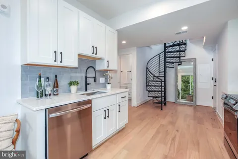 a view of entryway with wooden floor