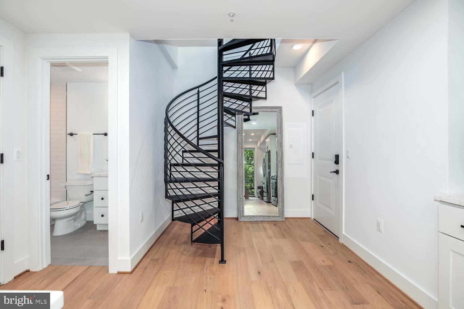 2601 30th Street Northeast, Unit 11 Washington, DC 20018 - Photo 10 of 32 a view of entryway with wooden floor
