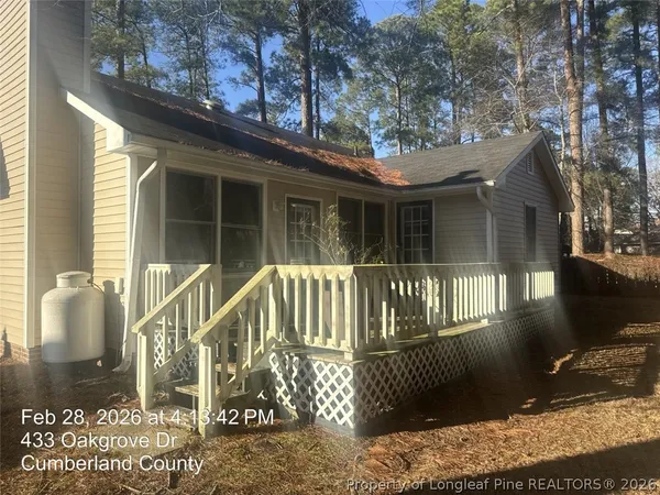 a front view of a house with a porch