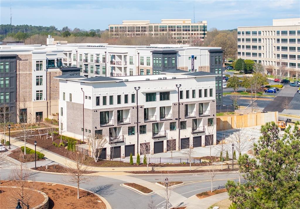7230 Summit Place Alpharetta, GA 30009 - Photo 1 of 37 a front view of a building with street view