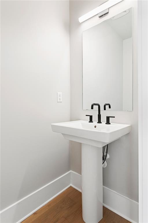 7230 Summit Place Alpharetta, GA 30009 - Photo 12 of 37 a bathroom with a sink a mirror and shower