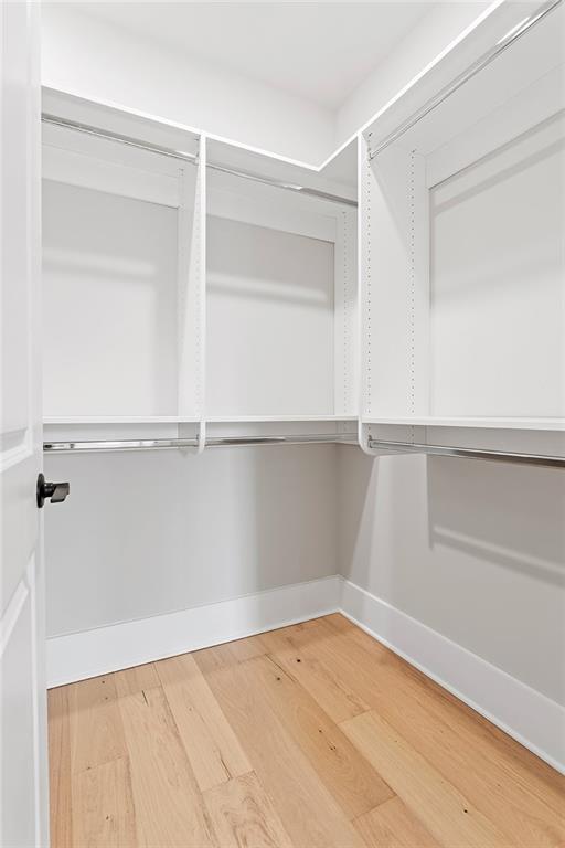 7230 Summit Place Alpharetta, GA 30009 - Photo 20 of 37 a view of an empty walk in closet