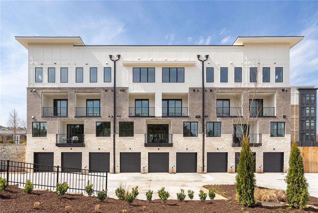 7230 Summit Place Alpharetta, GA 30009 - Photo 2 of 37 a view of building with a street