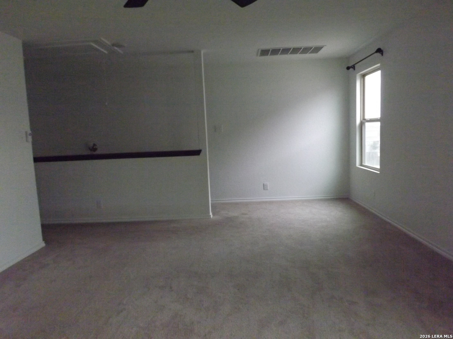 6835 Alaskan Wy. Converse, TX 78109 - Photo 9 of 22 an empty room with windows