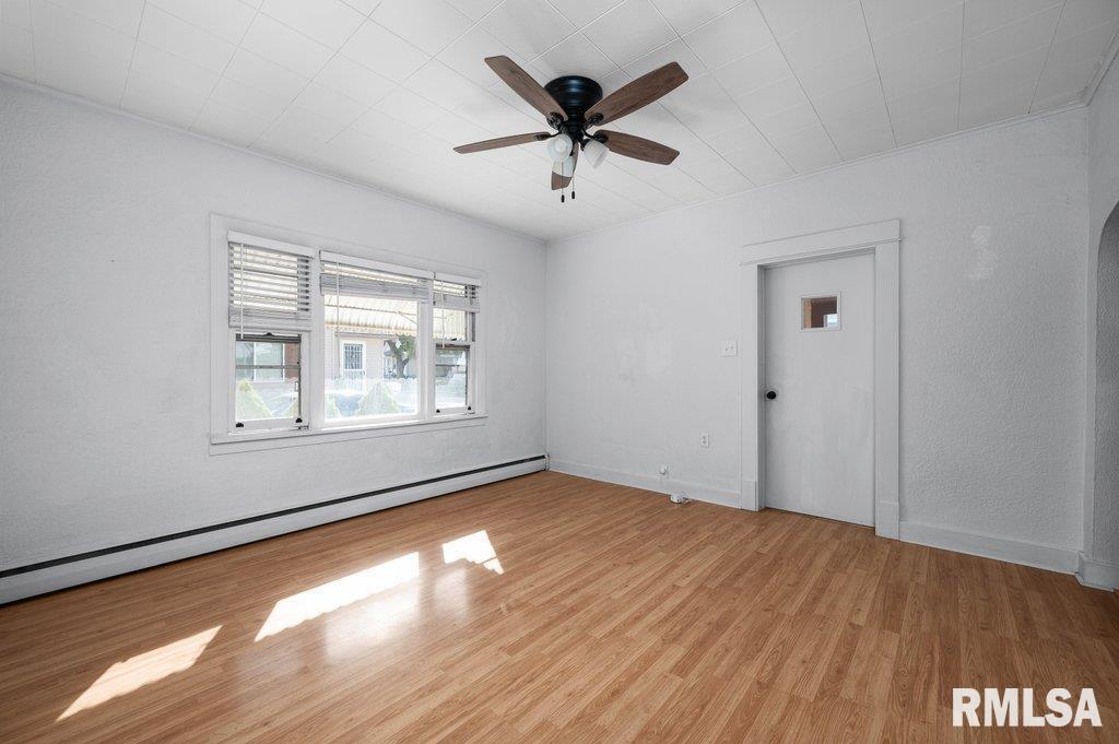 216 North Boss Street Kewanee, IL 61443 - Photo 17 of 36 wooden floor in an empty room with a window