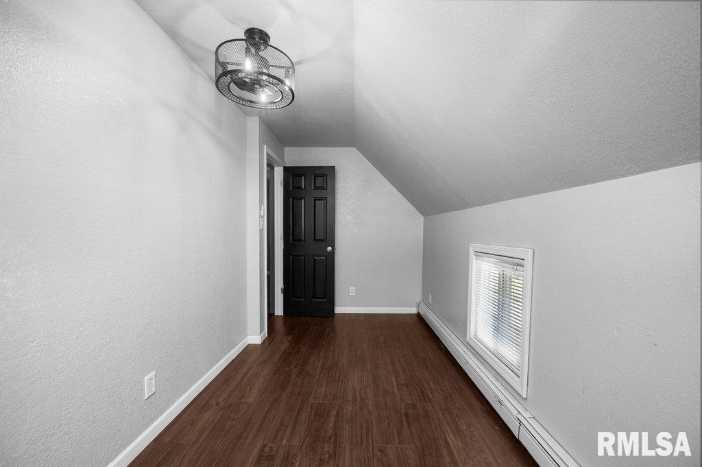 216 North Boss Street Kewanee, IL 61443 - Photo 26 of 36 a view of a hallway with wooden floor and a window