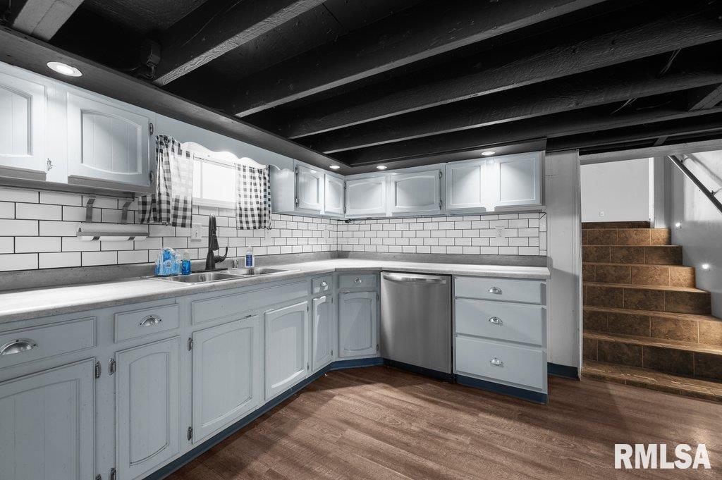 216 North Boss Street Kewanee, IL 61443 - Photo 7 of 36 a kitchen with granite countertop white cabinets and white appliances