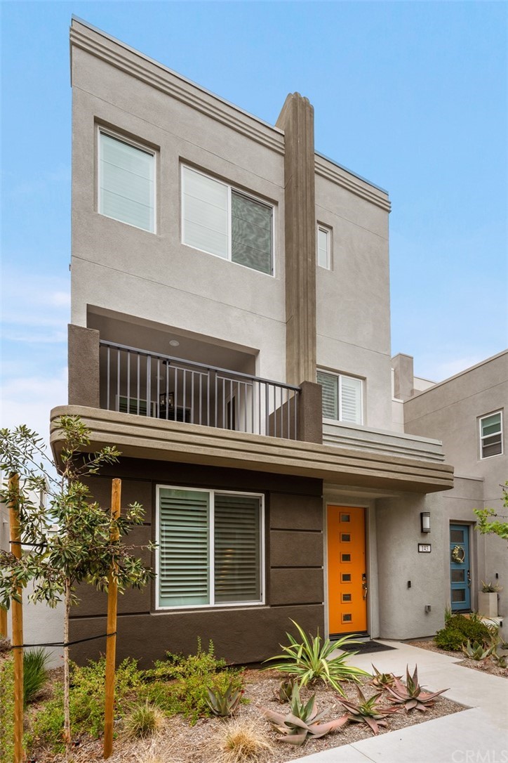 143 Tenor Irvine, CA 92618 - Photo 1 of 1 a front view of a house with parking space