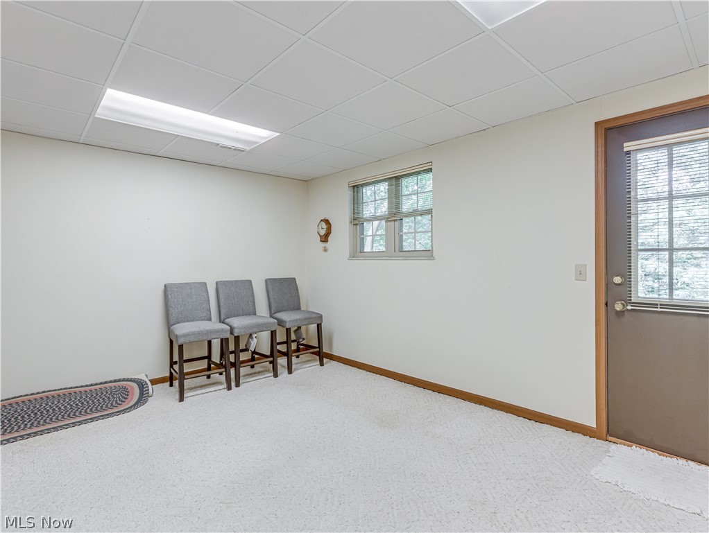 245 Perry Drive Northwest Canton, OH 44708 - Photo 21 of 25 Finished rec room in lower level walks out to small patio.