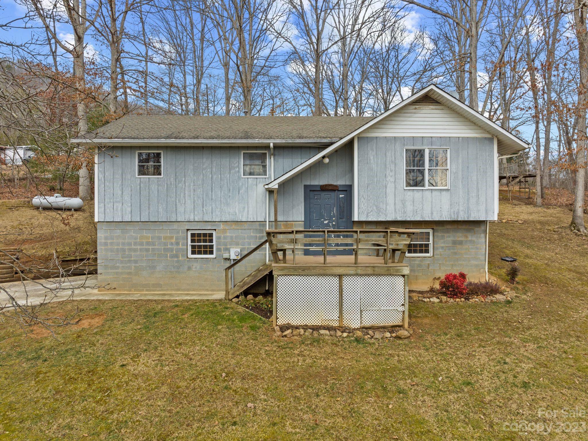 314 Moody Ridge Road Clyde, NC 28721 - Photo 3 of 41 a view of a house with a yard