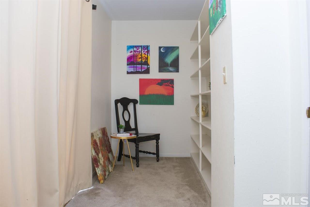 3969 Kings Row Reno, NV 89503 - Photo 7 of 14 a view of a workspace with furniture and a window