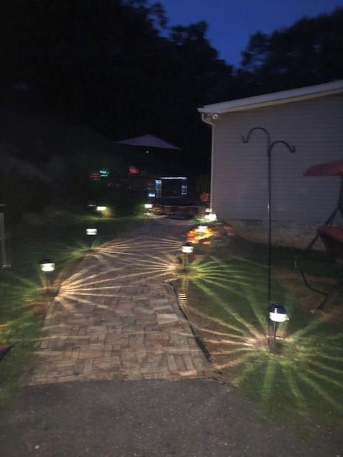 2537 Salt Pond Road Blue Ridge, VA 24064 - Photo 22 of 22 a backyard of a house with table and chairs