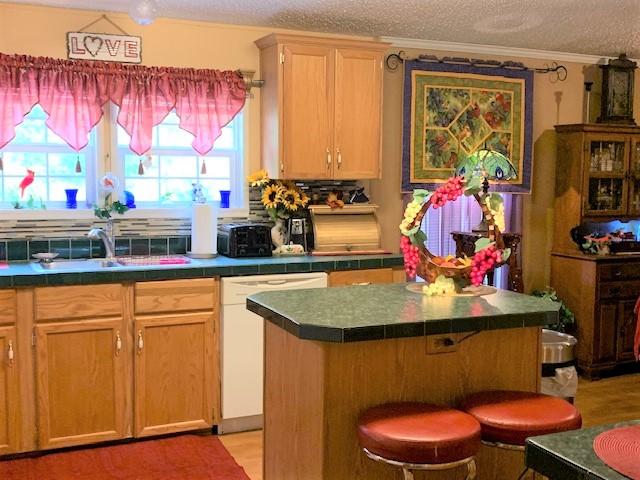 2537 Salt Pond Road Blue Ridge, VA 24064 - Photo 5 of 22 a room with stainless steel appliances a sink cabinets and a window