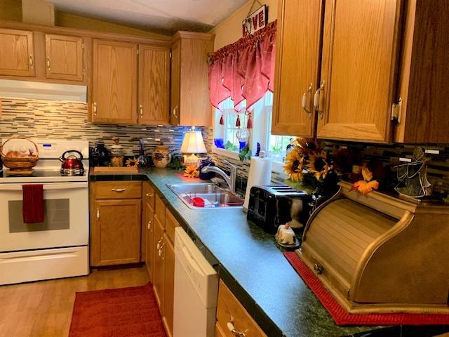 2537 Salt Pond Road Blue Ridge, VA 24064 - Photo 9 of 22 a kitchen with a sink a stove and cabinets