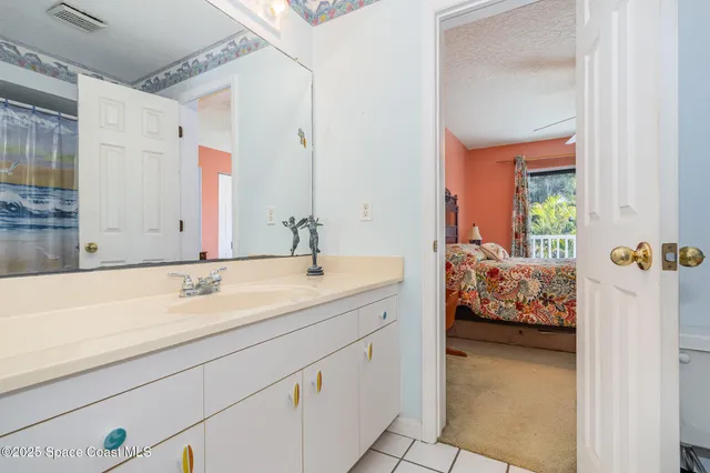 a balcony with wooden floor and fence
