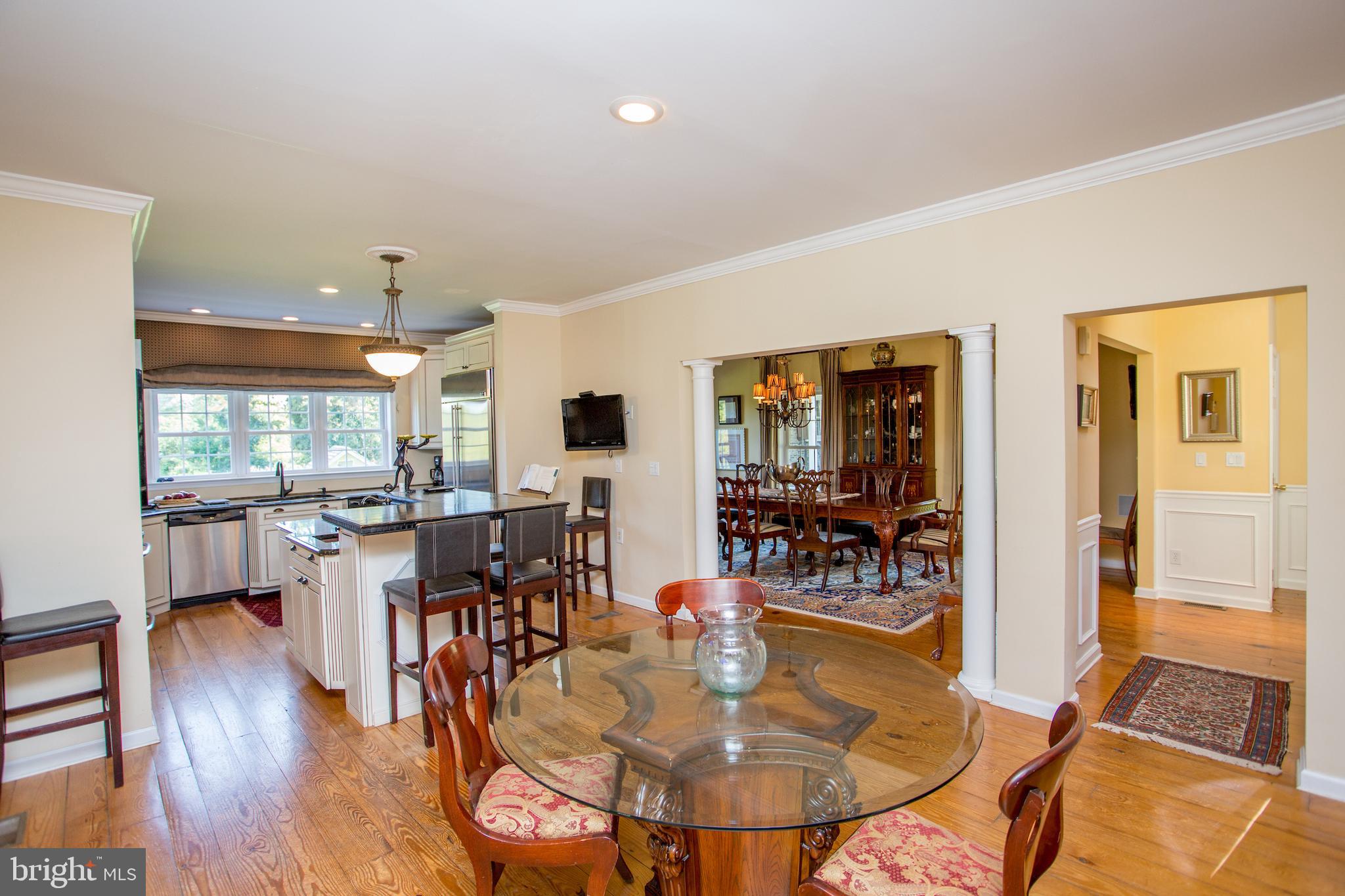 3605 Windy Bush Road New Hope, PA 18938 - Photo 55 of 55 a dining room with wooden floor and large windows
