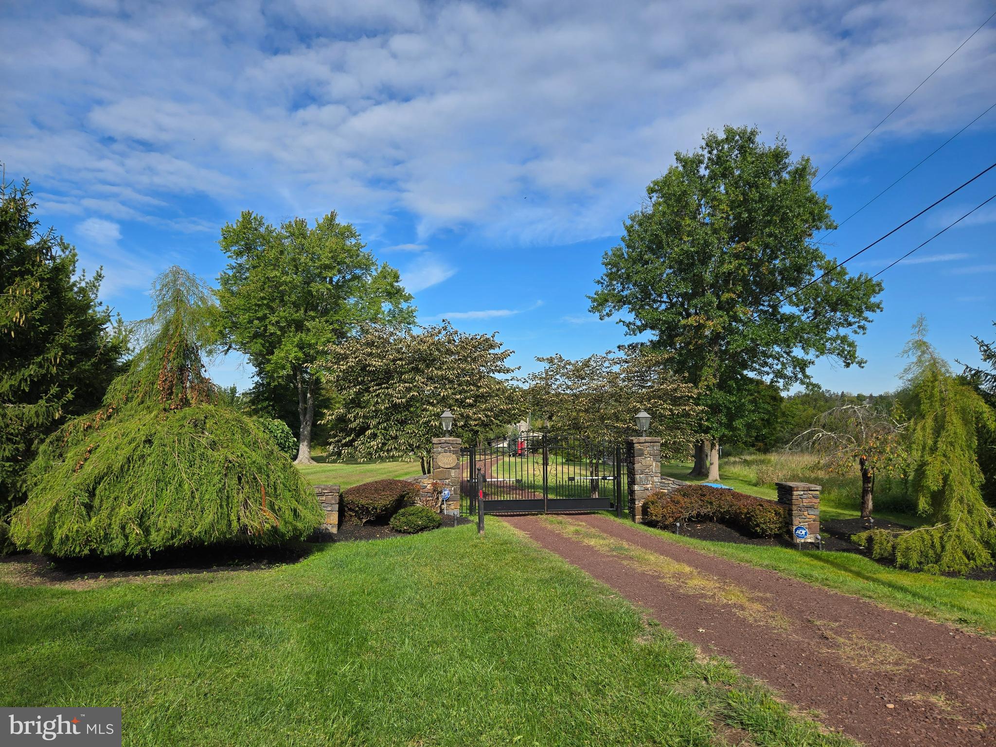 3605 Windy Bush Road New Hope, PA 18938 - Photo 2 of 55 a view of a garden with a building in the background