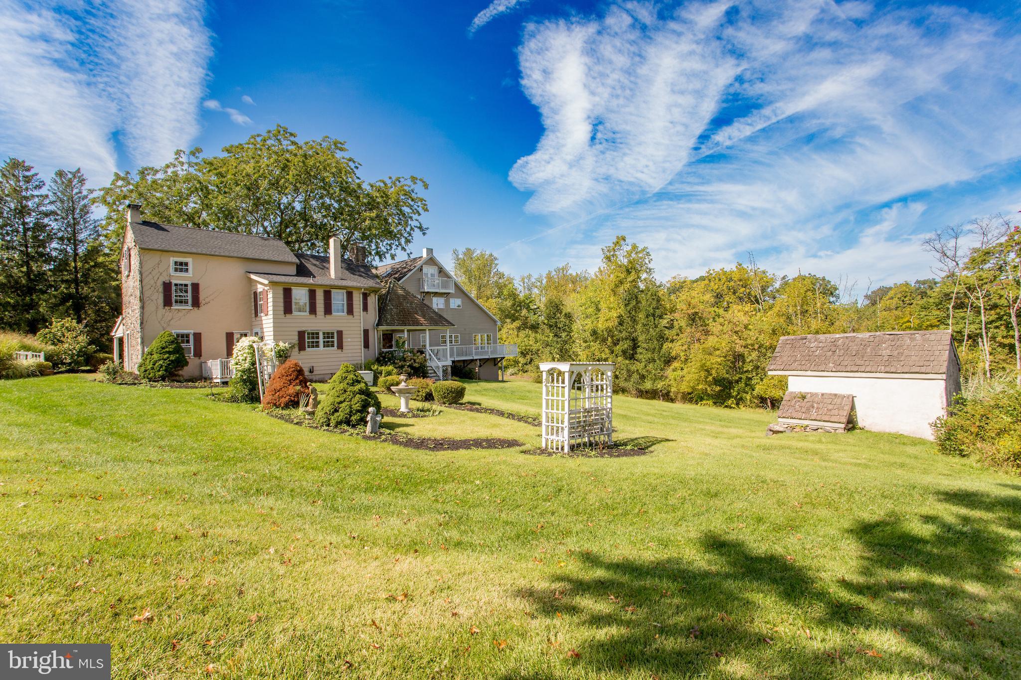 3605 Windy Bush Road New Hope, PA 18938 - Photo 44 of 55 a view of a house with backyard porch and sitting area