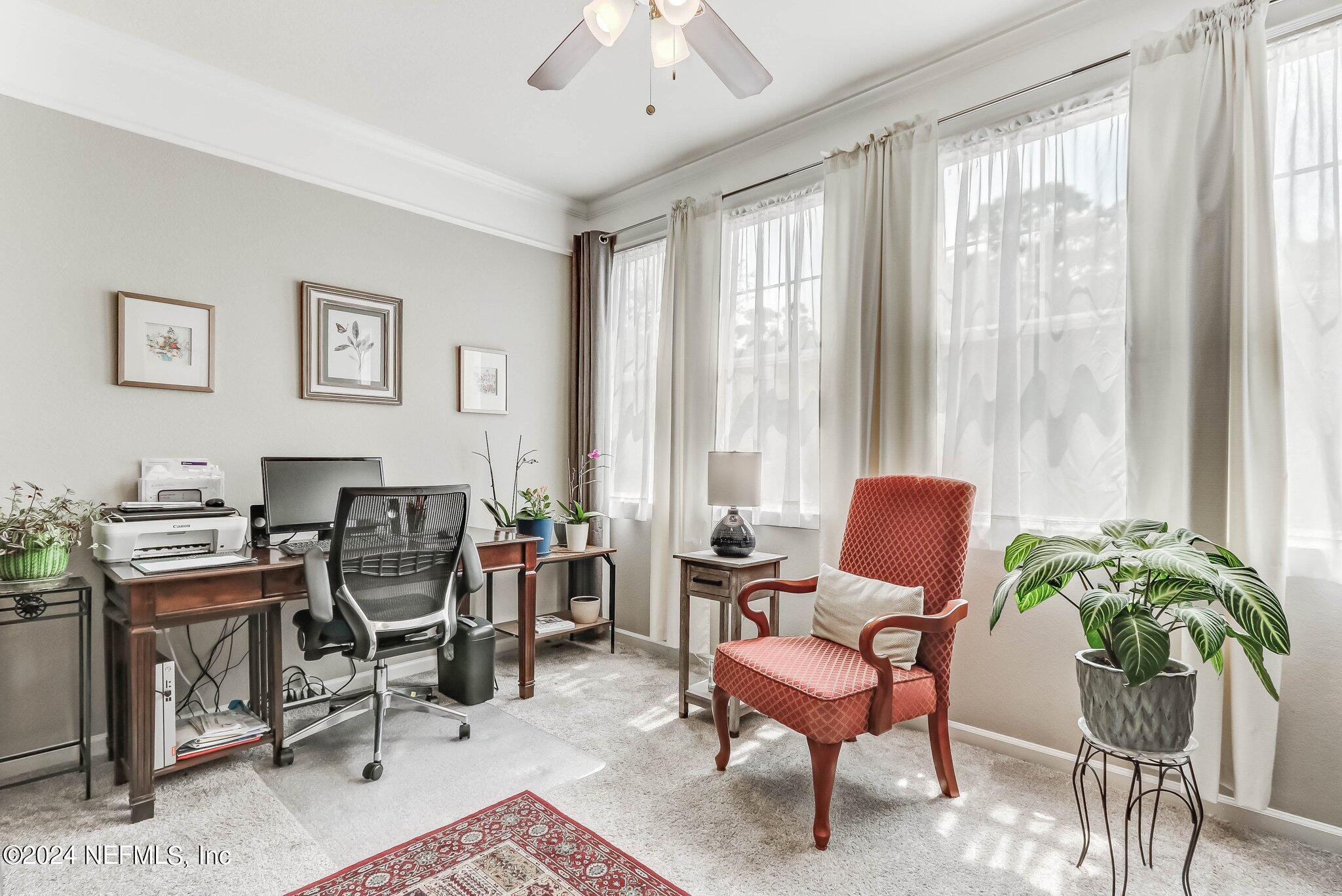 8550 Touchton Road, Unit 1423 Jacksonville, FL 32216 - Photo 12 of 36 a workspace with furniture and a window