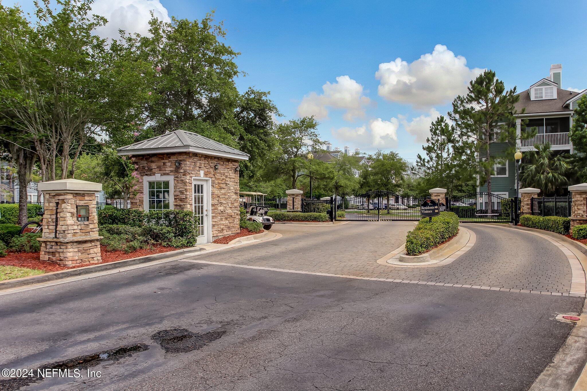 8550 Touchton Road, Unit 1423 Jacksonville, FL 32216 - Photo 24 of 36 a view of street with cars parked