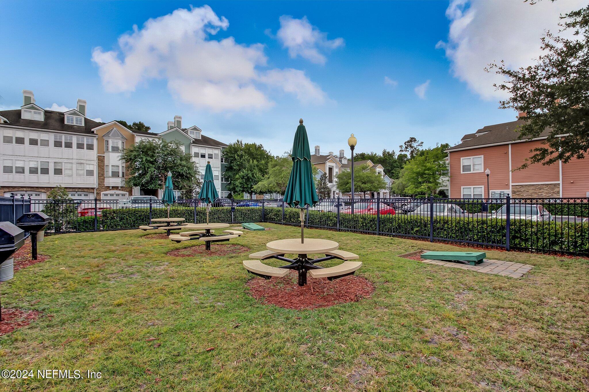 8550 Touchton Road, Unit 1423 Jacksonville, FL 32216 - Photo 36 of 36 a view of a fountain in front of a house