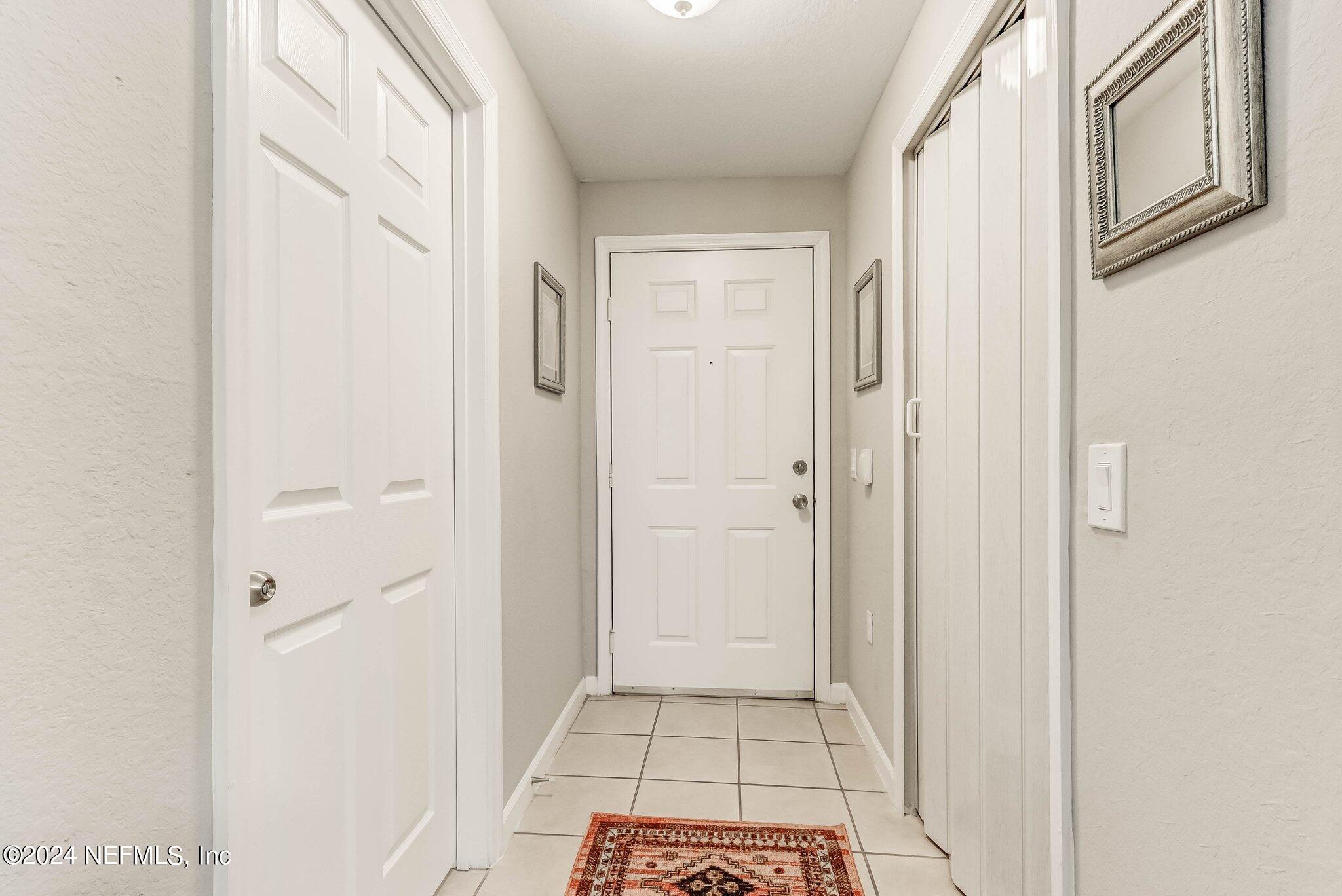 8550 Touchton Road, Unit 1423 Jacksonville, FL 32216 - Photo 4 of 36 a view of a hallway