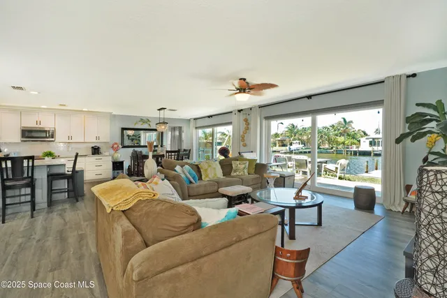 an aerial view of a house with a lake view